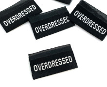 1 Label - OVERDRESSED - Schwarz - Anlukaa