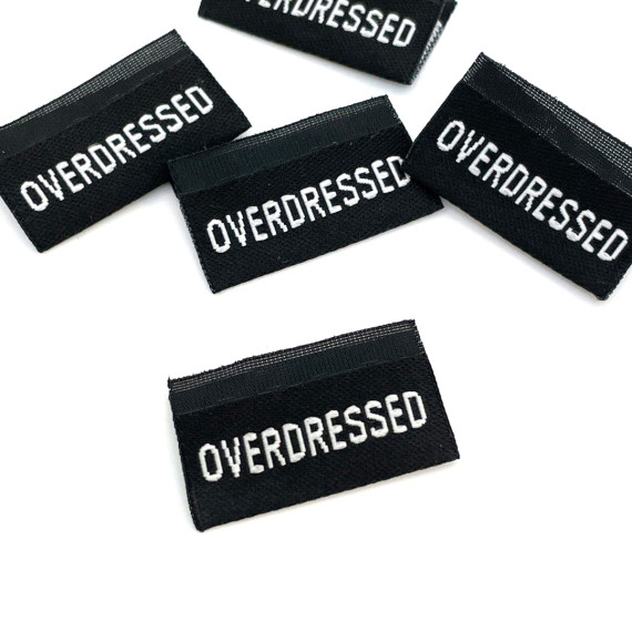 1 Label - OVERDRESSED - Schwarz - Anlukaa