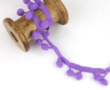 1 Meter Bommelborte mit Zierband - Pomponborte - Uni - Lila