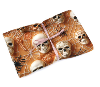 1,15m Zuschnitt -  French Terry - Spiders & Skulls - Rostorange
